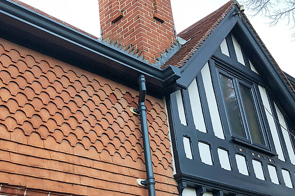 Aluminium moulded ogee and trad downpipes fitted by DIYer