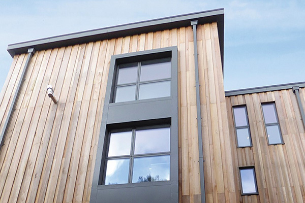 Aluminium box gutter and square downpipe for modern apartments