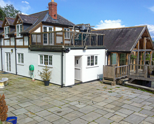 Black beaded deep flow guttering and traditional cast round downpipes fitted to residential property black powder coated beaded deep flow guttering and traditional cast round downpipes fitted to residential countryside property