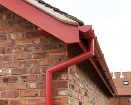 Guttercrest Aluminium Smoothline Flush Fit Joint Downpipes | Garston Barns guttercrest aluminium smoothline flush fit joint downpipes fixed to garston barns