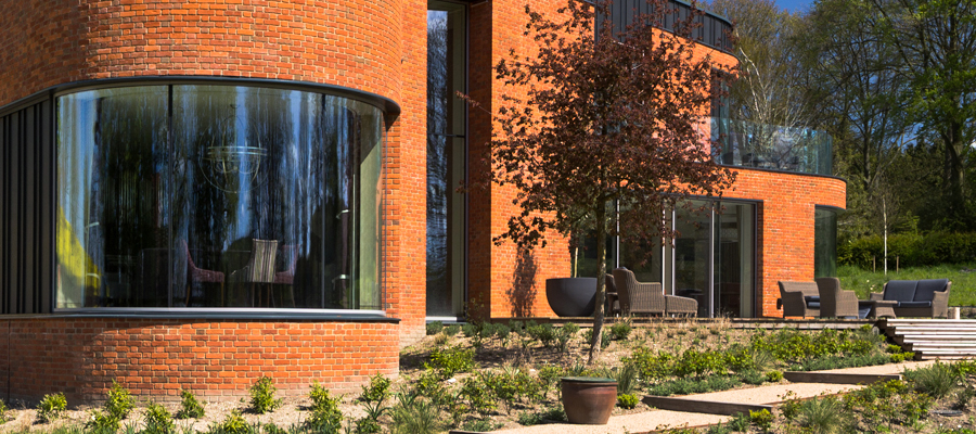 Aluminium curved cill flashings | Incurvo marine grade aluminium curved window flashings used on eco build project